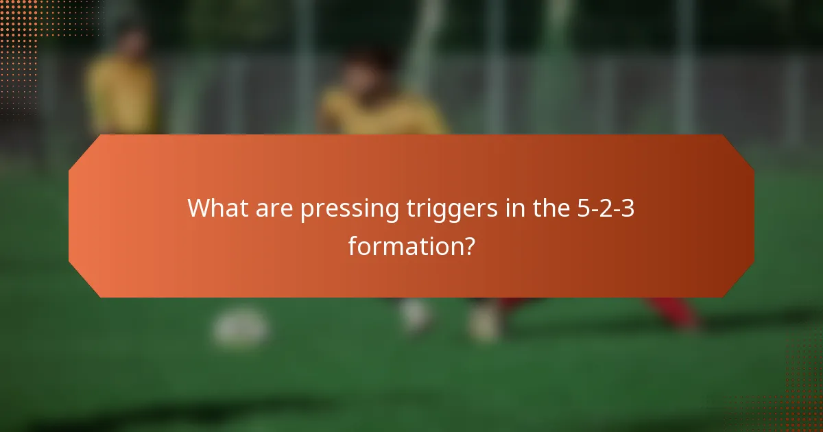 What are pressing triggers in the 5-2-3 formation?